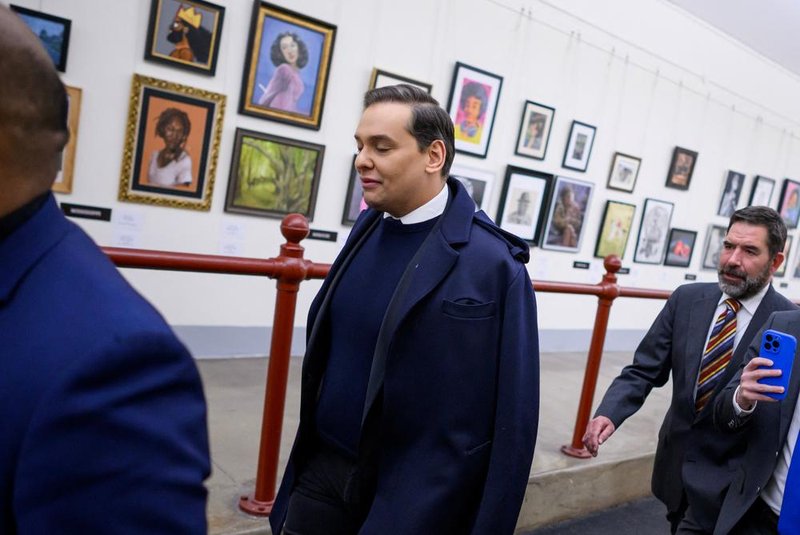 Rep. George Santos, R-NY, walks from his office to the US Capitol in Washington, DC, on December 1, 2023. The US House of Representatives is expected to vote on whether to expel US Representative George Santos from Congress, after the House Ethics Committee released a report stating it found "overwhelming evidence" Santos violated federal law, finding that he "sought to fraudulently exploit every aspect of his House candidacy for his own personal financial profit." (Photo by Mandel NGAN / AFP)<!-- NICAID(15614514) -->