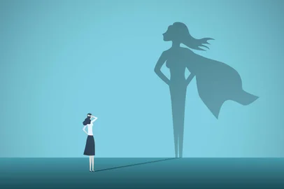 Businesswoman with superhero shadow vector concept. Business symbol of emancipation, ambition, success, motivation, leadership, courage and challenge.Super-herói, mulher nos negócios. Foto: jozefmicic / stock.adobe.comFonte: 222964522<!-- NICAID(15380312) -->
