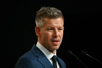 Peter Magyar, election winner and leader of the pro-European conservative TISZA party, delivers a press conference at the HUNGEXPO Congress and Exhibition Center in Budapest, Hungary, on April 13, 2026, one day after Hungarian general elections. The party of conservative Peter Magyar won a two-thirds parliamentary majority in Hungarian elections in a clear defeat for nationalist long-time Prime Minister Viktor Orban, according to near-complete results. (Photo by Attila KISBENEDEK / AFP)<!-- NICAID(16264785) -->