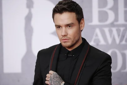 (FILES) British singer-songwriter Liam Payne poses on the red carpet on arrival for the BRIT Awards 2019 in London on February 20, 2019. Liam Payne, who died aged 31 after plunging from a hotel balcony in Buenos Aires, on October 16, 2024 spent more than half his life in the public eye as a member of one of the world's most successful boy bands. (Photo by Tolga AKMEN / AFP) / RESTRICTED TO EDITORIAL USE  NO POSTERS  NO MERCHANDISE NO USE IN PUBLICATIONS DEVOTED TO ARTISTSEditoria: ACELocal: LondonIndexador: TOLGA AKMENSecao: musicFonte: AFPFotógrafo: STR<!-- NICAID(15892543) -->