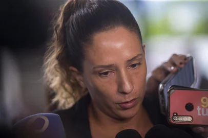 Councilwoman Monica Benicio, widow of slain Brazilian rights activist and politician Marielle Franco, speaks with members of the media outside the Federal Police headquartes in Rio de Janeiro, Brazil, on March 24, 2024. Brazilian police carried out an operation on Sunday to arrest the alleged "masterminds" of the 2018 murder of Rio de Janeiro councilwoman Marielle Franco, a crime that caused outrage in Brazil and abroad. (Photo by Daniel Ramalho / AFP)Editoria: CLJLocal: Rio de JaneiroIndexador: DANIEL RAMALHOSecao: human rightsFonte: AFPFotógrafo: STR<!-- NICAID(15714635) -->