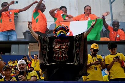 MAURO PIMENTEL / AFP An Ecuadorian fan wears an Aya Huma mask gestures ahead of the 2026 World Cup Group E football match between Ivory Coast and Ecuador at the Philadelphia Stadium in Philadelphia on June 14, 2026. (Photo by MAURO PIMENTEL / AFP)<!-- NICAID(16306184) -->