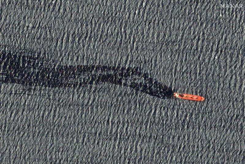 This handout satellite image released by Maxar Technologies on March 2, 2024 and dated March 1, shows the Belize-flagged cargo ship Rubymar, damaged in a February 19 missile strike claimed by the Iran-backed Huthi rebels, floating in the Red Sea. The Belize-flagged, British-registered and Lebanese-operated vessel carrying combustible fertiliser has sunk on March 2, according to the Yemeni government. (Photo by Satellite image ©2024 Maxar Technologies / AFP) / RESTRICTED TO EDITORIAL USE - MANDATORY CREDIT "AFP PHOTO/ SATELLITE IMAGE ©2024 MAXAR TECHNOLOGIES" - NO MARKETING NO ADVERTISING CAMPAIGNS - DISTRIBUTED AS A SERVICE TO CLIENTS - THE WATERMARK MAY NOT BE REMOVED/CROPPED<!-- NICAID(15696558) -->