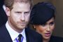 Príncipe Harry e sua esposa, Meghan Markle, a duquesa de Sussex, em cortejo fúnebre de Elizabeth II, realizado em 14 de setembro de 2022.<!-- NICAID(15206731) -->