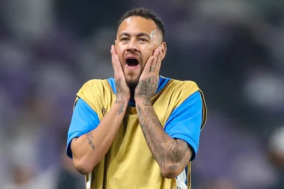 (FILES) Hilal's Brazilian forward #10 Neymar warms up ahead of the AFC Champions League group B football match between UAE's Al-Ain and Saudi's Al-Hilal at the Hazza bin Zayed Stadium in al-Ain on October 21, 2024. Brazilian star Neymar said 2026 will be his last World Cup with Brazil, who have yet to qualify for football's showpiece event, and was confident the Canarinha will improve their level to fight for their sixth world title, according to statements reported on January 7, 2025, by CNN. (Photo by AFP)<!-- NICAID(15954806) -->