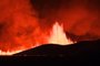 Flowing lava is seen during at a fissure on the Reykjanes peninsula 3km north of Grindavik, western Iceland on December 18, 2023. A volcanic eruption began on Monday night in Iceland, south of the capital Reykjavik, following an earthquake swarm, Iceland's Meteorological Office reported. (Photo by Kristinn Magnusson / AFP) / Iceland OUT<!-- NICAID(15629671) -->