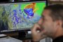 Forecasters of Meteo France, French national meteorological service, are at work to monitor "Batsirai", a new tropical cyclone formed over the Indian Ocean and which started moving westward, toward Mauritius, Réunion and Madagascar, on February 2, 2022 in Saint-Denis on the French Indian Ocean island of La Reunion. (Photo by Richard BOUHET / AFP)Editoria: WEALocal: Saint-Denis de la ReunionIndexador: RICHARD BOUHETSecao: reportFonte: AFPFotógrafo: STR<!-- NICAID(15009078) -->