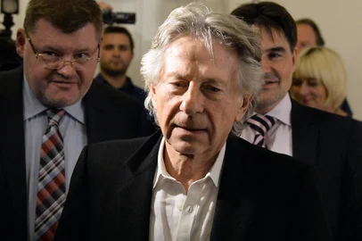 (FILES) This file photo taken on October 30, 2015 shows Oscar-winning director Roman Polanski arriving for a press conference after his trial at the regional court in Krakow.Poland on May 31, 2016 relaunched a procedure to extradite Polanski to the United States to face sentencing for a 1977 case of statutory rape. / AFP PHOTO / JANEK SKARZYNSKI<!-- NICAID(12230054) -->