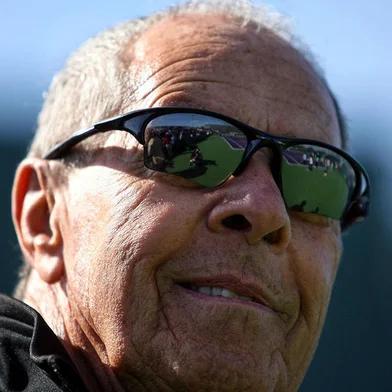 (FILES) This file photo taken on March 23, 2010 shows legendary tennis coach Nick Bollettieri at Crandon Park Tennis Center in Key Biscayne. - Legendary tennis coach Nick Bollettieri, who helped develop superstars such as Andre Agassi and Maria Sharapova, has died aged 91, the IMG Academy announced in a statement on December 5, 2022. (Photo by Marc SEROTA / GETTY IMAGES NORTH AMERICA / AFP)<!-- NICAID(15285996) -->