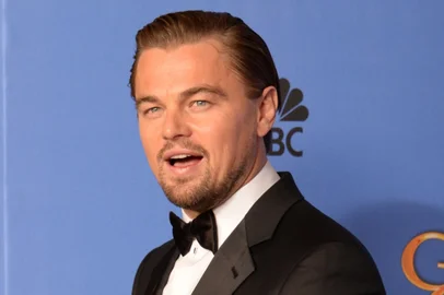461491239Actor Leonardo DiCaprio celebrates winning Best Actor in a Motion Picture - Musical or Comedy for "The Wolf of Wall Street" in the press room during the 71st Annual Golden Globe Awards in Beverly Hills, California, January 12, 2014.   AFP PHOTO / Robyn BECKEditoria: ACELocal: Beverly HillsIndexador: ROBYN BECKSecao: CinemaFonte: AFPFotógrafo: STF<!-- NICAID(10130125) -->