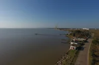 Área próxima do Estaleiro EBR em São José do Norte, com vista para a Ilha do Terrapleno e cidade de Rio Grande.<!-- NICAID(15217777) -->