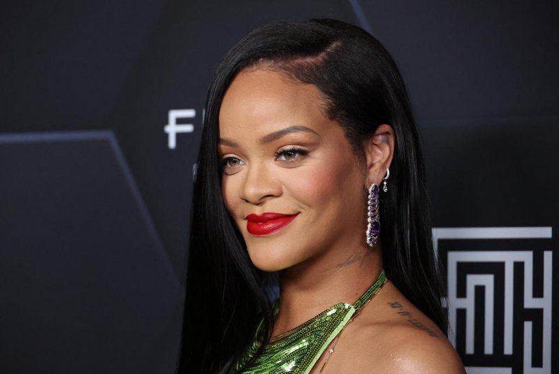 LOS ANGELES, CALIFORNIA - FEBRUARY 11: Rihanna poses for a picture as she celebrates her beauty brands fenty beauty and fenty skin at Goya Studios on February 11, 2022 in Los Angeles, California.   Mike Coppola/Getty Images/AFP (Photo by Mike Coppola / GETTY IMAGES NORTH AMERICA / Getty Images via AFP)<!-- NICAID(15022610) -->