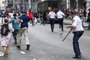 NEW YORK, NEW YORK - AUGUST 04: Plates and chairs are thrown near Chelsea as members of the NYPD respond to the disruptions caused by large crowds during a "giveaway" event hosted by popular Twitch live streamer Kai Cenat in Union Square and the surrounding area on August 4, 2023in New York City. Cenat, who announced on social media that he would be giving away video game consoles and other items, is reportedly in police custody after a crowd sparked disorder in the park leading to numerous arrests.   Alexi J. Rosenfeld/Getty Images/AFP (Photo by Alexi J. Rosenfeld / GETTY IMAGES NORTH AMERICA / Getty Images via AFP)<!-- NICAID(15502135) -->