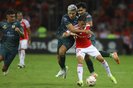 Real Tomayapo's defender Leonardo Justiniano (L) and Internacional's Argentine defender Alexandro Bernabei (front) fight for the ball during the Copa Sudamericana group stage first leg match between Brazil's Internacional and Bolivia's Real Tomayapo at the Beira-Rio Stadium in Porto Alegre, Brazil, on April 10, 2024. (Photo by SILVIO AVILA / AFP)Editoria: SPOLocal: Porto AlegreIndexador: SILVIO AVILASecao: soccerFonte: AFPFotógrafo: STR<!-- NICAID(15731377) -->