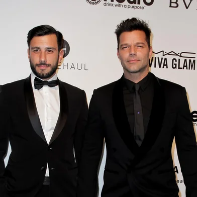 (FILES) This file photo taken on February 26, 2017 shows Syrian-Swedish artist Jwan Yosef and Puerto Rico's Ricky Martin upon their arrival for the 25th annual Elton John AIDS Foundation's Academy Awards Viewing Party in West Hollywood, California.Singer Ricky Martin of "Livin' la Vida Loca" fame announced January 10, 2018 he has married his partner of two years, Jwan Yosef."I'm a husband," the Puerto Rican singer told E! television without specifying the date of the wedding. "We're doing a heavy party in a couple of months." The 46-year-old singer began going out in 2016 with Yosef, 33, a Syrian-born Swedish artist. / AFP PHOTO / <!-- NICAID(13361134) -->