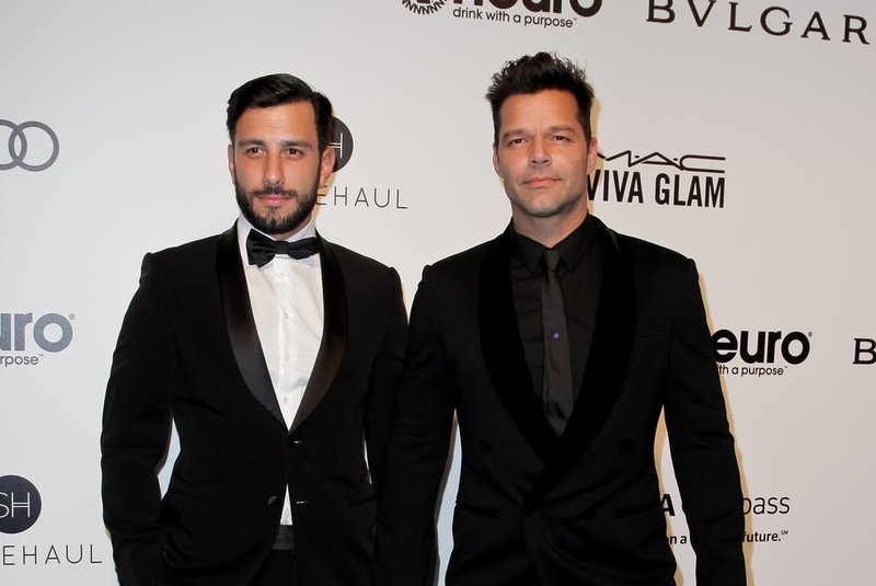 (FILES) This file photo taken on February 26, 2017 shows Syrian-Swedish artist Jwan Yosef and Puerto Rico's Ricky Martin upon their arrival for the 25th annual Elton John AIDS Foundation's Academy Awards Viewing Party in West Hollywood, California.Singer Ricky Martin of "Livin' la Vida Loca" fame announced January 10, 2018 he has married his partner of two years, Jwan Yosef."I'm a husband," the Puerto Rican singer told E! television without specifying the date of the wedding. "We're doing a heavy party in a couple of months." The 46-year-old singer began going out in 2016 with Yosef, 33, a Syrian-born Swedish artist. / AFP PHOTO / <!-- NICAID(13361134) -->