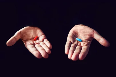 Red Pill Blue Pill concept. The right choice the concept of the movie matrix. The choice of tabletsRed Pill Blue Pill concept. The right choice the concept of the movie matrix. The choice of tablets.Fonte: 219619155<!-- NICAID(15362265) -->