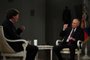 In this pool photograph distributed by Russian state agency Sputnik, Russia's President Vladimir Putin gives an interview to US talk show host Tucker Carlson at the Kremlin in Moscow on February 6, 2024. (Photo by Gavriil GRIGOROV / POOL / AFP)<!-- NICAID(15674268) -->