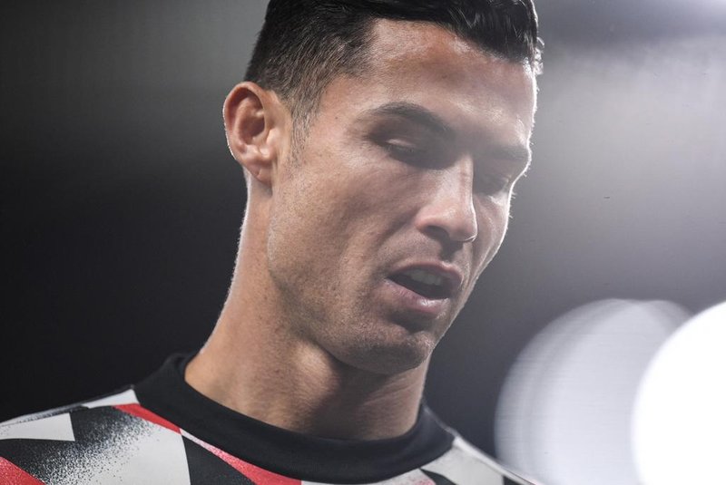 Manchester United's Portuguese striker Cristiano Ronaldo reacts during the warm up prior to the English Premier League football match between Manchester United and Tottenham Hotspur at Old Trafford in Manchester, north west England, on October 19, 2022. (Photo by Oli SCARFF / AFP) / RESTRICTED TO EDITORIAL USE. No use with unauthorized audio, video, data, fixture lists, club/league logos or 'live' services. Online in-match use limited to 120 images. An additional 40 images may be used in extra time. No video emulation. Social media in-match use limited to 120 images. An additional 40 images may be used in extra time. No use in betting publications, games or single club/league/player publications. / Editoria: SPOLocal: ManchesterIndexador: OLI SCARFFSecao: soccerFonte: AFPFotógrafo: STR<!-- NICAID(15241687) -->