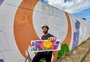 Artistas pintam trecho interno do muro da Avenida Mauá no South Summit