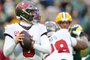 GREEN BAY, WISCONSIN - DECEMBER 17: Baker Mayfield #6 of the Tampa Bay Buccaneers drops back to pass during a game against the Green Bay Packers at Lambeau Field on December 17, 2023 in Green Bay, Wisconsin. The Buccaneers defeated the Packers 34-20.   Stacy Revere/Getty Images/AFP (Photo by Stacy Revere / GETTY IMAGES NORTH AMERICA / Getty Images via AFP)<!-- NICAID(15630105) -->