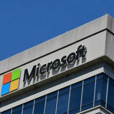 A Microsoft logo adorns a building in Chevy Chase, Maryland on May 19, 2021. - Microsoft said it is retiring Internet Explorer, the browser it created more than 25 years and which is now largely abandoned as people instead use competitors like Google's Chrome or Apple's Safari."We are announcing that the future of Internet Explorer on Windows 10 is in Microsoft Edge," the company said in a blog post Wednesday, referring to its other browser. (Photo by Eva HAMBACH / AFP)<!-- NICAID(14789407) -->