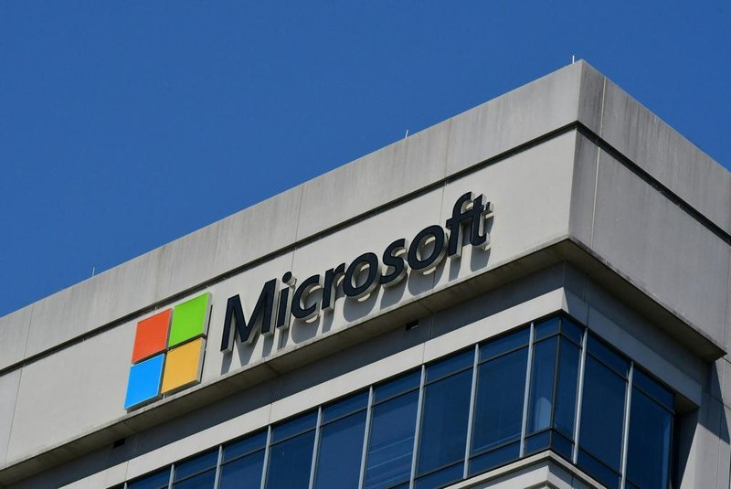 A Microsoft logo adorns a building in Chevy Chase, Maryland on May 19, 2021. - Microsoft said it is retiring Internet Explorer, the browser it created more than 25 years and which is now largely abandoned as people instead use competitors like Google's Chrome or Apple's Safari."We are announcing that the future of Internet Explorer on Windows 10 is in Microsoft Edge," the company said in a blog post Wednesday, referring to its other browser. (Photo by Eva HAMBACH / AFP)<!-- NICAID(14789407) -->