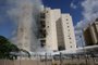 Apartments in a residential building catch fire during a rocket attack from the Gaza Strip in the southern Israeli city of Ashkelon, on October 7, 2023. Palestinian militant group Hamas has launched a "war" against Israel, Defence Minister Yoav Gallant said, after barrages of rockets were fired from the Gaza Strip into Israeli territory on October 7. (Photo by AHMAD GHARABLI / AFP)<!-- NICAID(15562969) -->