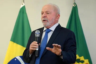 Brazil's President Luiz Inacio Lula da Silva speaks during a meeting with parliamentarians at Planalto Palace in Brasilia on January 11, 2023. - Parliamentarians brought Lula da Silva a document approving the decree of federal intervention issued by the federal government after Sunday's confrontations in Brasilia, when a far-right mob of supporters of former president Jair Bolsonaro stormed the federal powers buildings unleashing chaos on the capital. (Photo by EVARISTO SA / AFP)<!-- NICAID(15318733) -->