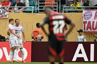 Bayern Munich's English forward #09 Harry Kane celebrates after scoring his team's fourth goal with teammate Croatian defender #44 Josip Stanisic during the FIFA Club World Cup 2025 round of 16 football match between Brazil's Flamengo and Germany's Bayern Munich at the Hard Rock Stadium in Miami on June 29, 2025. (Photo by PATRICIA DE MELO MOREIRA / AFP)<!-- NICAID(16069901) -->