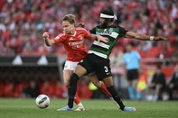 Sporting Lisbon's Dutch defender #03 Jerry St. Juste (R) vies for the ball with Benfica's Norwegian forward #21 Andreas Schjelderup during the Portuguese League football match between SL Benfica and Sporting CP at Estadio da Luz in Lisbon, on May 10, 2025. (Photo by Patricia DE MELO MOREIRA / AFP)<!-- NICAID(16034579) -->