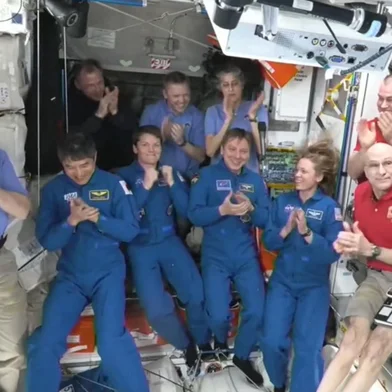This screengrab made from a NASA livestream shows the SpaceX Dragon Crew-10 members (C, in dark blue) NASA astronauts Anne McClain and Nichole Ayers, JAXA (Japan Aerospace Exploration Agency) astronaut Takuya Onishi, and Roscosmos cosmonaut Kirill Peskov, clapping after entering the International Space Station flanked by NASA astronauts Butch Wilmore, Suni Williams, Nick Hague and Don Pettit and Russian cosmonauts Aleksandr Gorbunov, Alexey Ochinin and Ivan Vagner, on March 16, 2025. The SpaceX Dragon Spacecraft carrying the four Crew-10 members docked to the International Space Station on March 16 at 12:04 a.m. EDT. Their arrival at the  the ISS will enable the long-overdue departure from the ISS of NASA duo Butch Wilmore and Suni Williams. The two former US Navy pilots have been stuck aboard the orbital lab since June after the Boeing Starliner spacecraft they were testing on its maiden crewed voyage suffered propulsion issues and was deemed unfit to fly them back to Earth. (Photo by NASA / AFP) / RESTRICTED TO EDITORIAL USE - MANDATORY CREDIT "AFP PHOTO / NASA " - NO MARKETING NO ADVERTISING CAMPAIGNS - DISTRIBUTED AS A SERVICE TO CLIENTS<!-- NICAID(15997091) -->