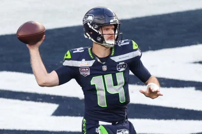 Seattle Seahawks’ quarterback #14 Sam Darnold throws the football during Super Bowl LX between the New England Patriots and the Seattle Seahawks at Levi's Stadium in Santa Clara, California on February 8, 2026. (Photo by Patrick T. Fallon / AFP)