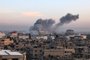 This picture taken in Rafah in the southern Gaza Strip shows smoke rising after an Israeli strike on December 3, 2023, amid continuing battles between Israel and the militant group Hamas. Israel carried out deadly bombardments in Gaza on December 3 as international calls mounted for greater protection of civilians and the renewal of an expired truce with Palestinian militant group Hamas. (Photo by SAID KHATIB / AFP)<!-- NICAID(15615208) -->