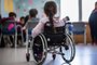 children disabled person in wheelchairs at school, inclusive education generative ai.Fonte: 590613477<!-- NICAID(15566307) -->