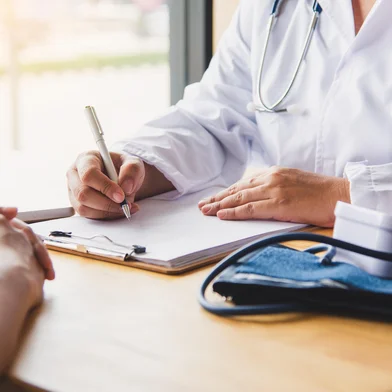 The doctor is discussing with the patient after a physical examination of the results and treatment guidelines.photobyphotoboy /  stock.adobe.com<!-- NICAID(15954238) -->
