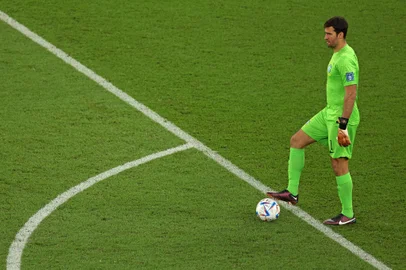 Brazil's goalkeeper #01 Alisson stops the ball during the Qatar 2022 World Cup Group G football match between Brazil and Switzerland at Stadium 974 in Doha on November 28, 2022. (Photo by Adrian DENNIS / AFP)<!-- NICAID(15281079) -->