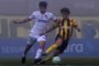 Facundo Pellistri (R) of Penarol vies for the ball with Felipe Carballo of Nacional during a Uruguayan tournament football match at the Centenario stadium in Montevideo on August 9, 2020, amid the new coronavirus pandemic. - The match is played behind closed doors as a preventive measure against the spread of the COVID-19. (Photo by PABLO PORCIUNCULA / AFP)Editoria: SPOLocal: MontevideoIndexador: PABLO PORCIUNCULASecao: soccerFonte: AFPFotógrafo: STF<!-- NICAID(14590143) -->
