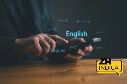 Translator app, language course and e-learning concept. Person use smartphone with Translator app, translation or translate on the mobile app worldwide language conversation speaking concept.<!-- NICAID(16251285) -->
