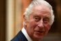 Britain's King Charles III reacts as he meets members of the Westend Gospel Choir after a ceremony commemorating the 50th anniversary of the Resettlement of British Asians from Uganda, at Buckingham Palace in London on November 2, 2022. (Photo by ISABEL INFANTES / various sources / AFP)Editoria: HUMLocal: LondonIndexador: ISABEL INFANTESSecao: imperial and royal mattersFonte: AFPFotógrafo: STR<!-- NICAID(15254441) -->