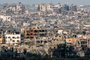 This picture taken from Israel's southern border with the Gaza Strip on March 19, 2024 shows a view of destroyed buildings in the Palestinian territory following bombardments amid the ongoing conflict between Israel and the militant group Hamas. (Photo by JACK GUEZ / AFP)<!-- NICAID(15710519) -->