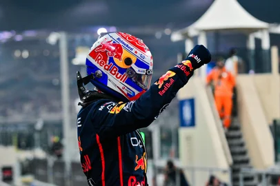 Red Bull Racing's Dutch driver Max Verstappen celebrates after taking the pole position at the end of the qualifying session ahead of the Abu Dhabi Formula One Grand Prix at the Yas Marina Circuit in Abu Dhabi on December 6, 2025. (Photo by Andrej ISAKOVIC / AFP)<!-- NICAID(16181702) -->