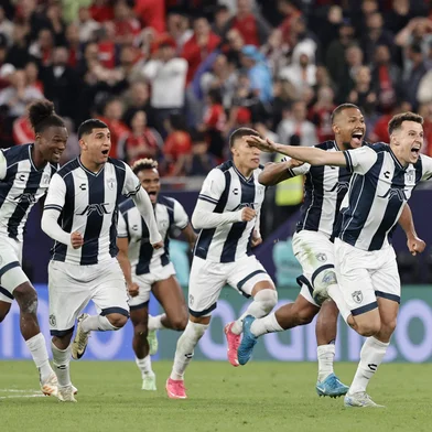 Pachuca's players celebrate winning the penalty shoot-out during the 2024 FIFA Intercontinental Cup football match between Mexico's Pachuca and Egypt's Al-Ahly at Stadium 974 in Doha on December 14, 2024. (Photo by KARIM JAAFAR / AFP)<!-- NICAID(15935884) -->