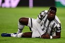 (FILES) Juventus' French midfielder Paul Pogba reacts after being tackled during the UEFA Europa League semi-final first leg football match between Juventus and Sevilla on May 11, 2023 at the Juventus stadium in Turin. France's World Cup winner Paul Pogba is facing the possibility of a lengthy ban after Italy's national anti-doping tribunal called for a four-year suspension for the Juventus midfielder, a club source told AFP on December 7, 2023. (Photo by Marco BERTORELLO / AFP)Editoria: SPOLocal: TurinIndexador: MARCO BERTORELLOSecao: soccerFonte: AFPFotógrafo: STF<!-- NICAID(15620376) -->
