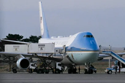 (FILES) This photograph shows a VC-25A Air Force One parked on the tarmac prior to US President Donald Trump's departure from Ankara Esenboga Airport in Ankara, Turkey, on July 8, 2026, after attending the NATO Summit. US President Donald Trump secretly flew out of Turkey last month on a smaller plane than previously known due to an assassination threat from Iran, the Washington Post reported on August 10, 2026. According to an anonymous US official who spoke to the Post, Trump boarded an Air Force One jet in Ankara on July 8, but then moved into a catering container attached to the plane. The container then ferried him to a smaller C-32A aircraft that flew him to Britain, while media and some officials were led to believe Trump was still on the bigger jet. (Photo by SAUL LOEB / AFP)<!-- NICAID(16344246) -->