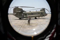 JOINT BASE ANDREWS, MARYLAND - JUNE 12: A U.S. Army CH-47 Chinook helicopter sits on the flight line on June 12, 2025 at Joint Base Andrews, Maryland. Army helicopters, including Black Hawks, Apaches, Chinooks, and other military aircraft, will be used in the upcoming U.S. Army's 250th birthday parade, which also coincides with Flag Day and U.S. President Trump's birthday.   Kayla Bartkowski/Getty Images/AFP (Photo by Kayla Bartkowski / GETTY IMAGES NORTH AMERICA / Getty Images via AFP)<!-- NICAID(16064922) -->