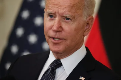 WASHINGTON, DC - JULY 15: U.S. President Joe Biden speaks during a joint news conference with German Chancellor Angela Merkel in the East Room of the White House on July 15, 2021 in Washington, DC. During what is likely her last official visit to Washington, Merkel and Biden discussed their shared priorities on climate change and defense; and Biden voiced his concerns about the Nord Stream 2 Russian natural gas pipeline.   Chip Somodevilla/Getty Images/AFP (Photo by CHIP SOMODEVILLA / GETTY IMAGES NORTH AMERICA / Getty Images via AFP)<!-- NICAID(14837359) -->