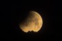 The moon is seen during a penumbral lunar eclipse in Skopje, on May 16, 2022. (Photo by Robert ATANASOVSKI / AFP)<!-- NICAID(15096905) -->