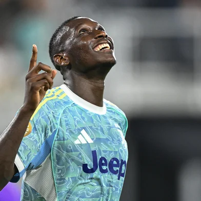 Juventus' French forward #20 Randal Kolo Muani celebrates scoring his team's fourth goal during the FIFA Club World Cup 2025 Group G football match between Italy's Juventus and UAE's Al Ain FC at the Audi Field stadium Washington, DC, on June 18, 2025. (Photo by ROBERTO SCHMIDT / AFP)<!-- NICAID(16063338) -->
