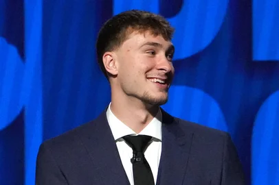 BROOKLYN, NY - JUNE 25: Cooper Flagg smiles during the 2025 NBA Draft - Round One on June 25, 2025 at Barclays Center in Brooklyn, New York. NOTE TO USER: User expressly acknowledges and agrees that, by downloading and or using this photograph, User is consenting to the terms and conditions of the Getty Images License Agreement. Mandatory Copyright Notice: Copyright 2025 NBAE   Jesse D. Garrabrant/NBAE via Getty Images/AFP (Photo by Jesse D. Garrabrant / NBAE / Getty Images / Getty Images via AFP)<!-- NICAID(16067581) -->